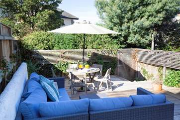The decked area to the back of the property is perfect for relaxing and entertaining.