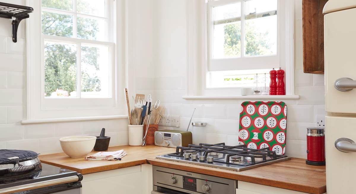 The gas hob and electric oven can be found in one corner of the kitchen. 