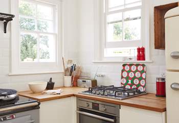 The gas hob and electric oven can be found in one corner of the Kitchen. 