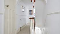 The light and airy first floor hallway. 