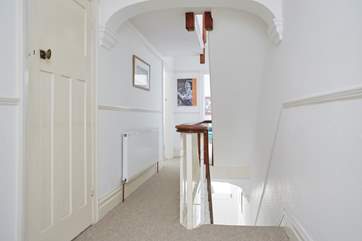 The light and airy first floor hallway.