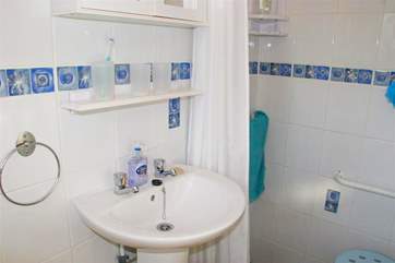 Family bathroom with walk-in shower.