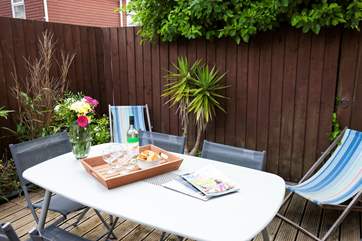 Outside dining on the enclosed patio.
