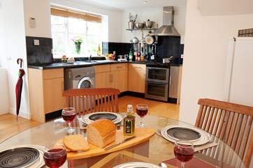 The kitchen is both modern and fully equipped.