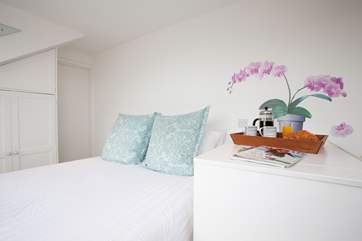 The main bedroom is in the eaves on the second floor; lovely, sunny and spacious.
