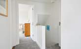 With a bathroom on this level, the first floor leads to a double and single bedroom. - Thumbnail Image