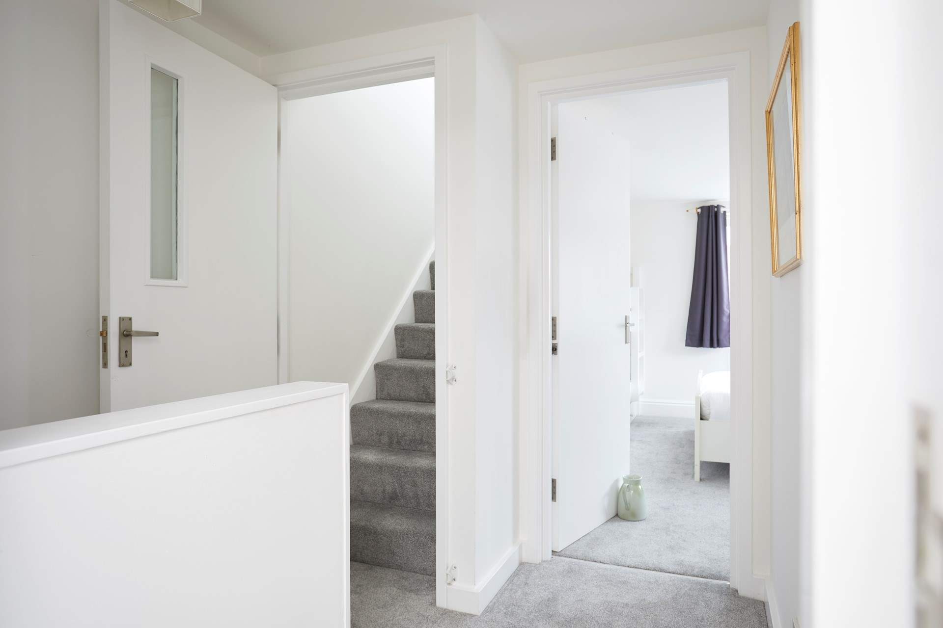 The second staircase flows to a further double bedroom on the top floor. 