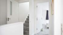 The second staircase rises to a further double bedroom on the top floor. 