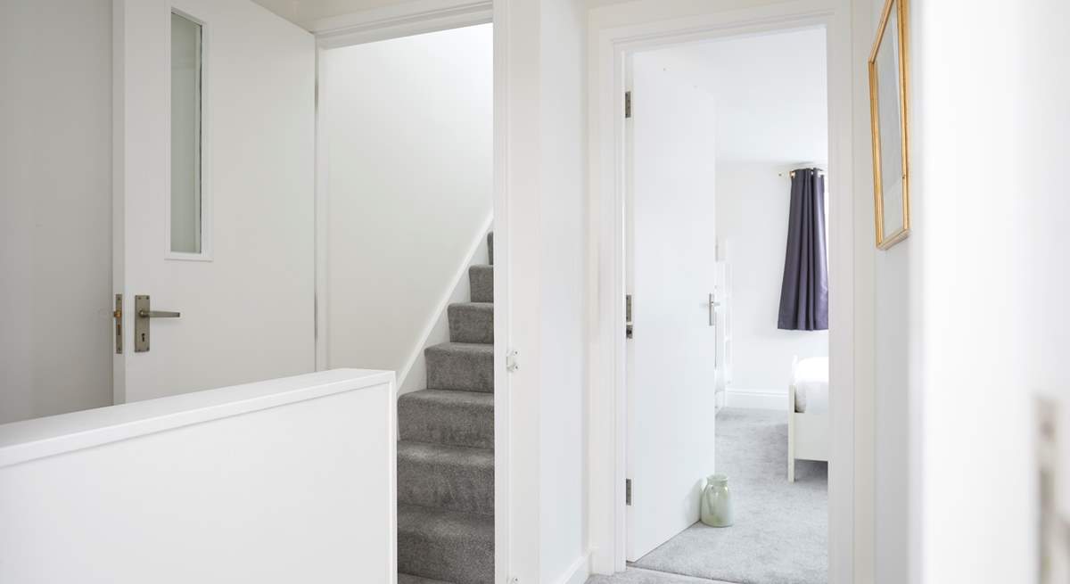 The second staircase flows to a further double bedroom on the top floor. 
