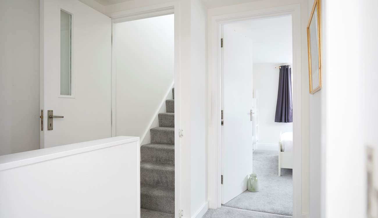 The second staircase flows to a further double bedroom on the top floor. 