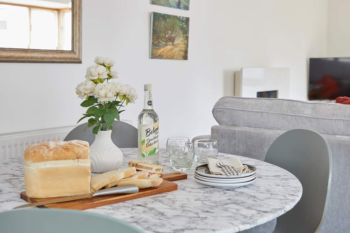 The dining area is ready for sociable mealtimes.