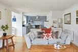Cosy seating awaits in the open plan living space. 
