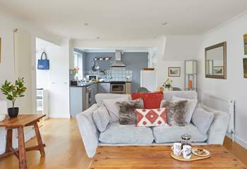 Cosy seating awaits in the open plan living space. 