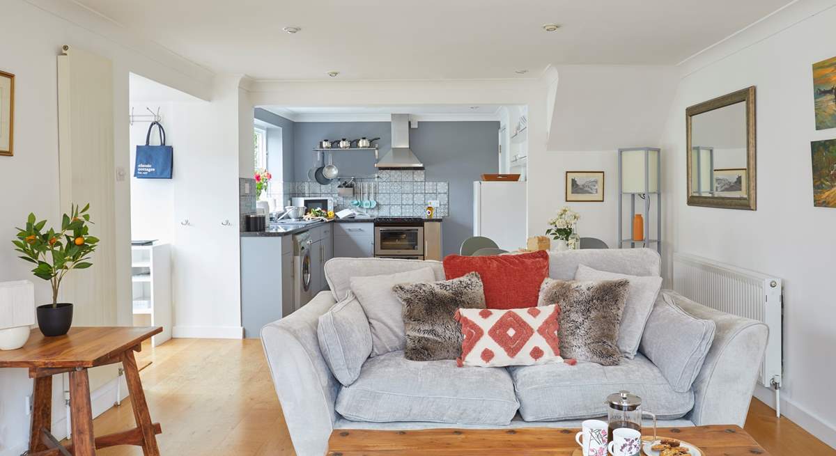 Cosy seating awaits in the open plan living space. 
