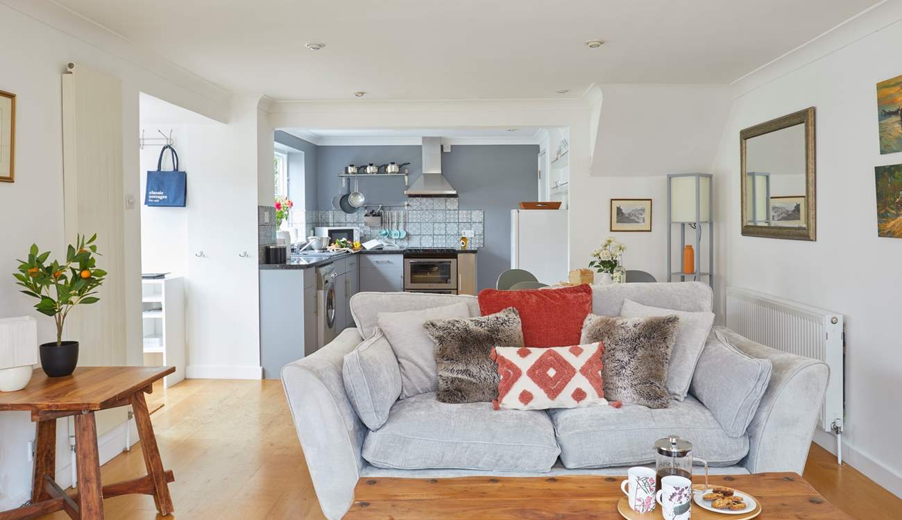 Cosy seating awaits in the open plan living space. 