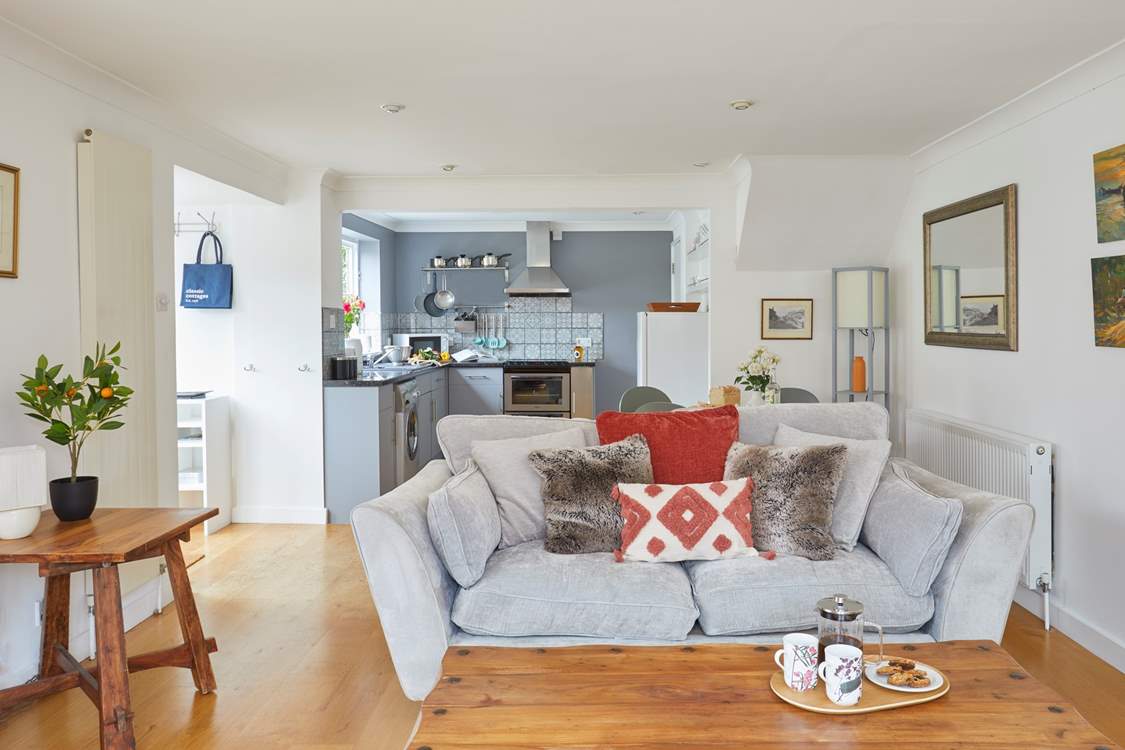Cosy seating awaits in the open plan living space.