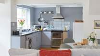 The kitchen is both modern and well-equipped to cook up a delicious meal. 