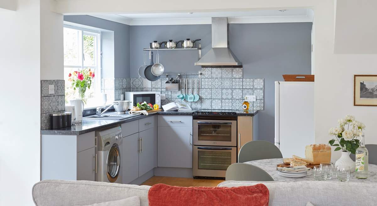 The kitchen is both modern and well-equipped to cook up a delicious meal. 