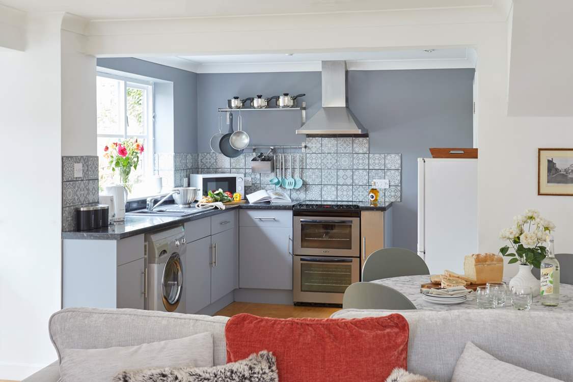 The kitchen is both modern and well-equipped to cook up a delicious meal.