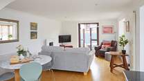 Step outside to the terrace from the spacious living area. 
