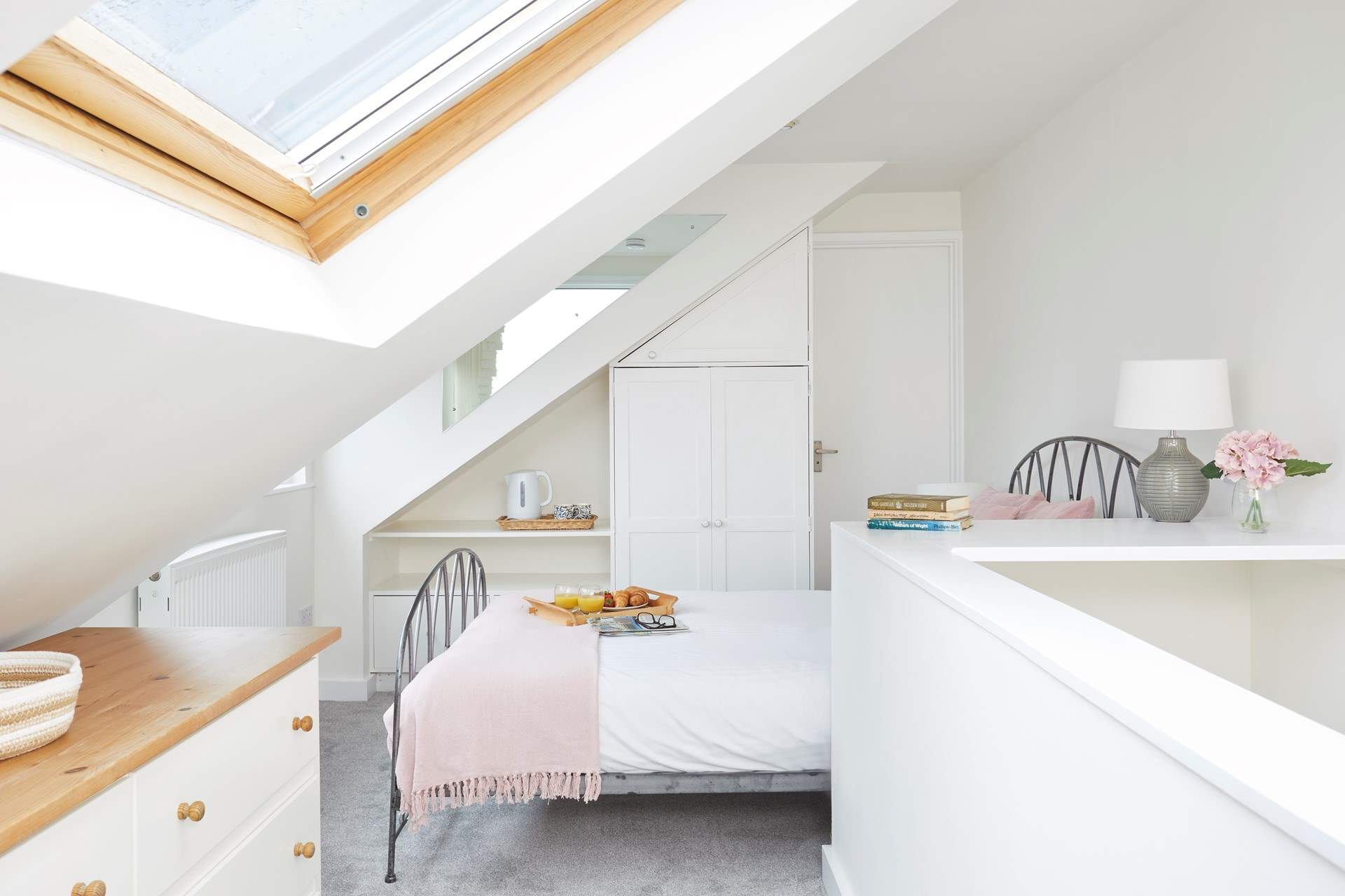 Welcome to the second floor bedroom in the eaves, complete with an en-suite shower room. 