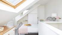 Welcome to the second floor bedroom in the eaves, complete with an en suite shower-room. Watch your head. 