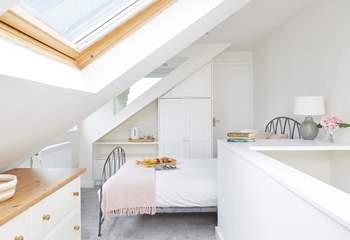Welcome to the second floor bedroom in the eaves, complete with an en-suite shower room. 