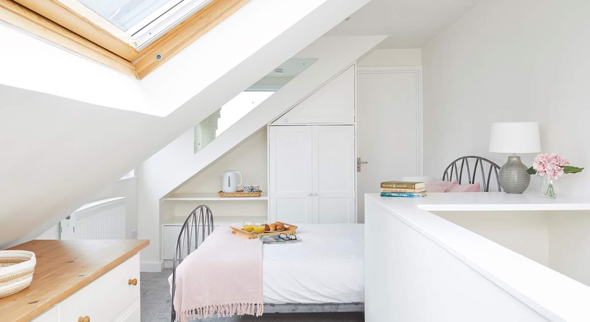 Welcome to the second floor bedroom in the eaves, complete with an en-suite shower room. 