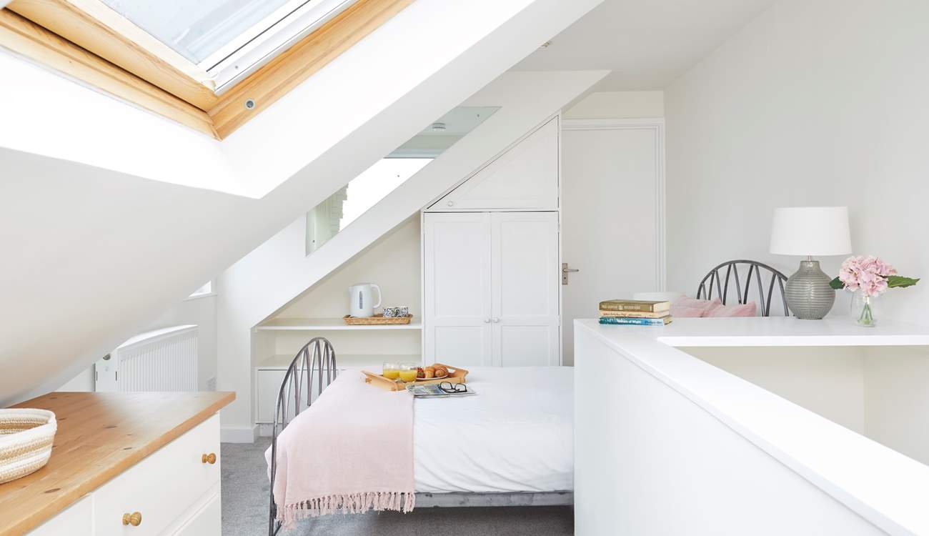 Welcome to the second floor bedroom in the eaves, complete with an en-suite shower room. 