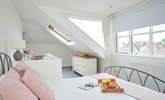 Plenty of windows allow for natural light and sea glimpses across the village rooftops.  - Thumbnail Image