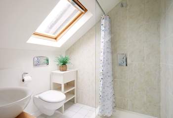 Step into the en-suite shower room to freshen up. 