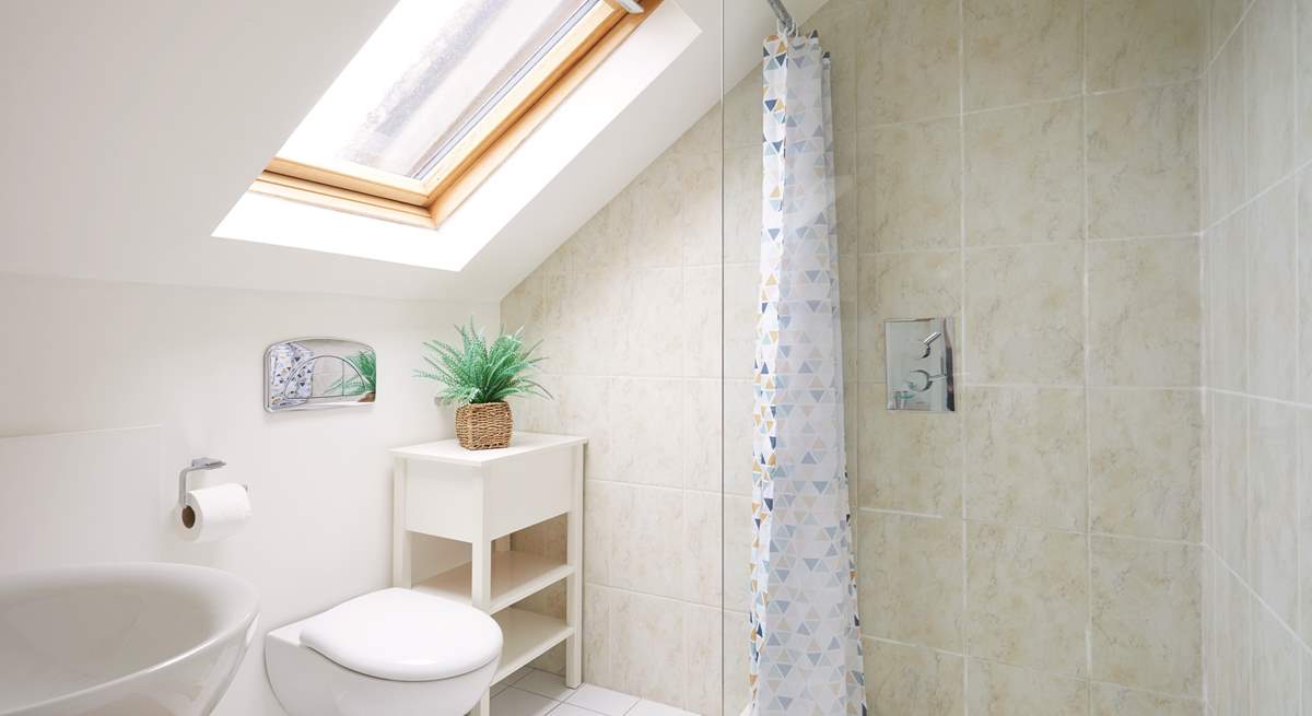 Step into the en-suite shower room to freshen up. 
