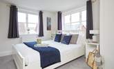 The inviting double bedroom on the first floor is bathed in natural light.  - Thumbnail Image