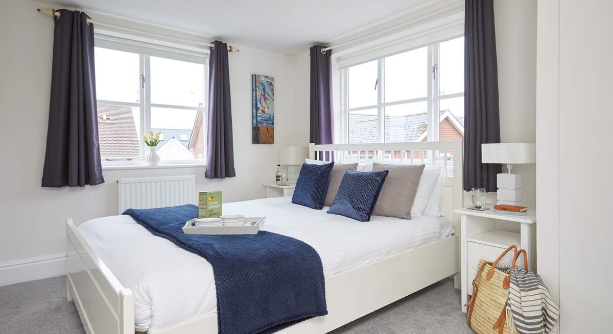 The inviting double bedroom on the first floor is bathed in natural light. 