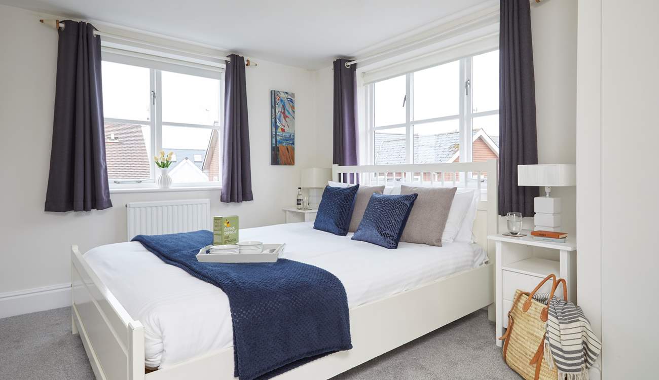 The inviting double bedroom on the first floor is bathed in natural light. 