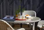 Enjoy your morning coffee in this lovely setting.
