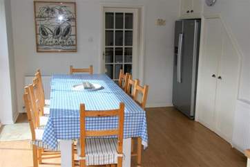A lovely gathering spot for family meals, the dining-area seats up to eight people.