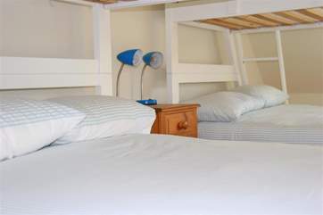 The double bed lower bunks provide added comfort and sleeping space.
