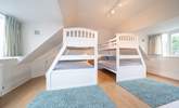 The family bedroom on the first floor offering flexible sleeping quarters that would suit adults and children alike... - Thumbnail Image