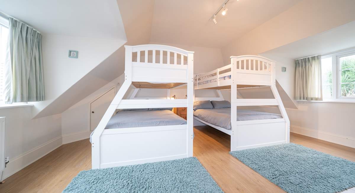 The family bedroom on the first floor offering flexible sleeping quarters that would suit adults and children alike...