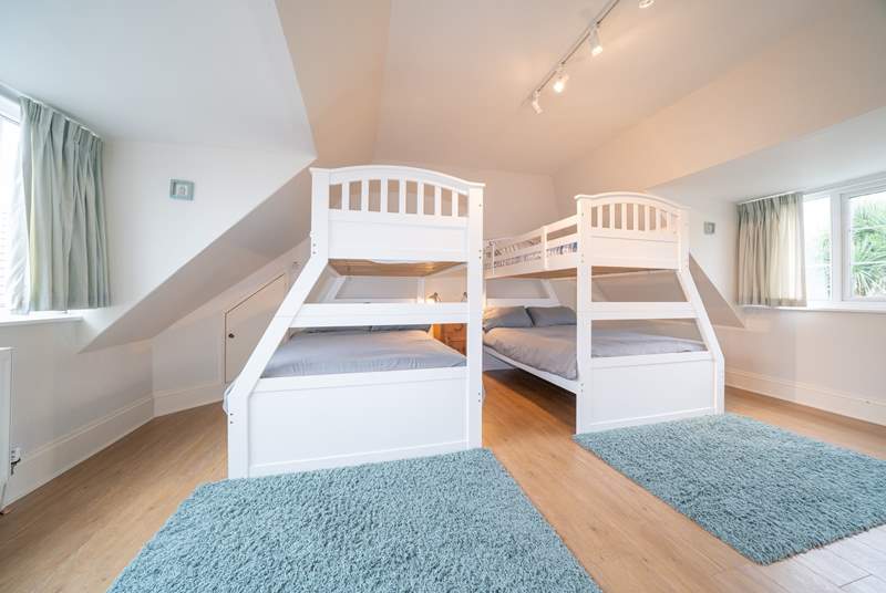 The family bedroom on the first floor offering flexible sleeping quarters that would suit adults and children alike...