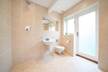 The spacious, modern wet-room on the ground floor is a real convenience.