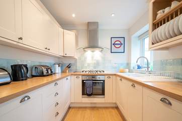 Cook up a treat in the well-equipped kitchen.