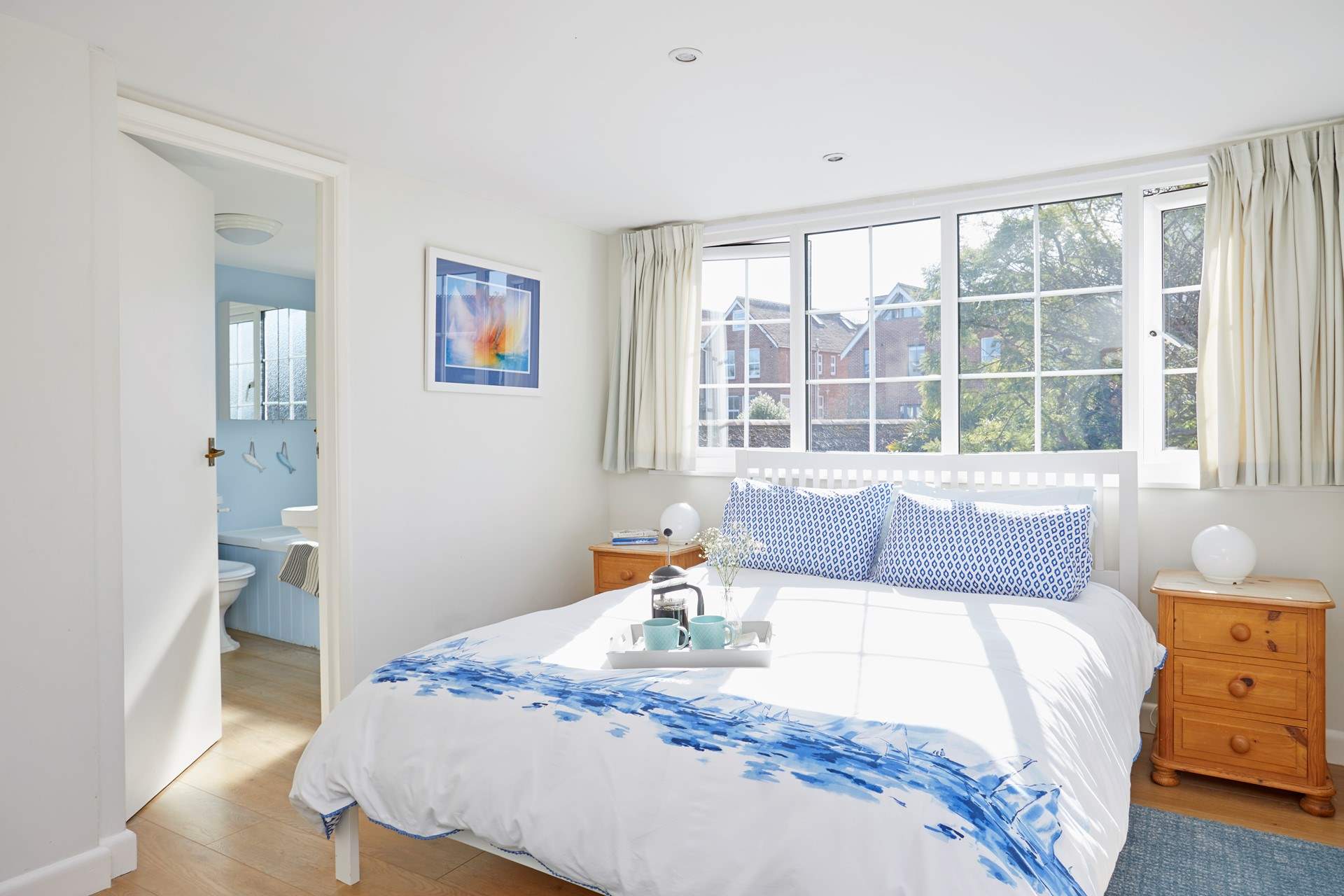 Fresh and bright bedroom decor.