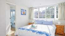 Fresh and bright bedroom decor.