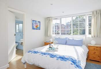 Fresh and bright bedroom decor.