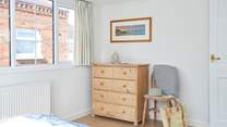 Natural light and a touch of coastal inspiration in this bedroom. 