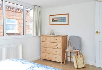 Natural light and a touch of coastal inspiration in this bedroom. 