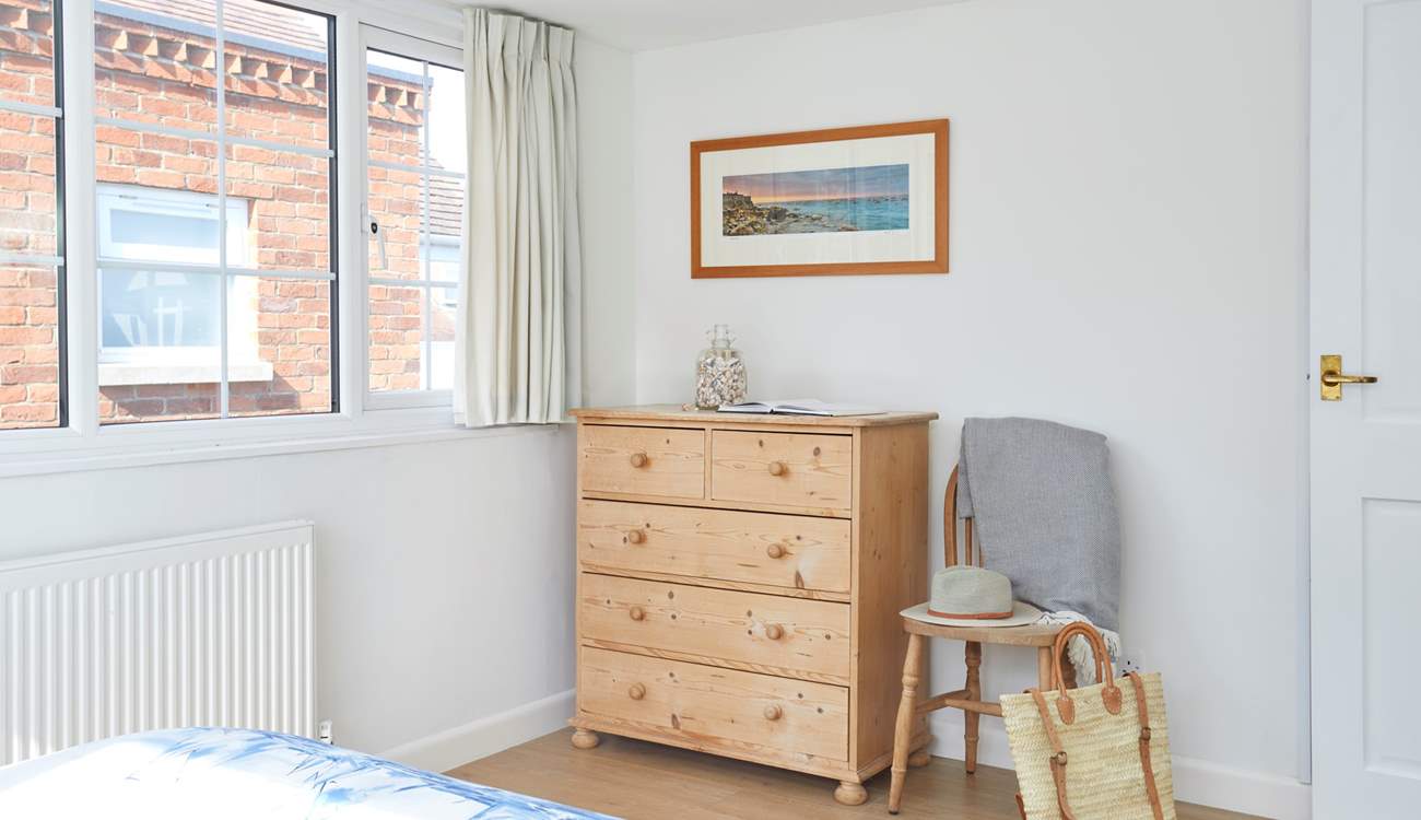 Natural light and a touch of coastal inspiration in this bedroom. 