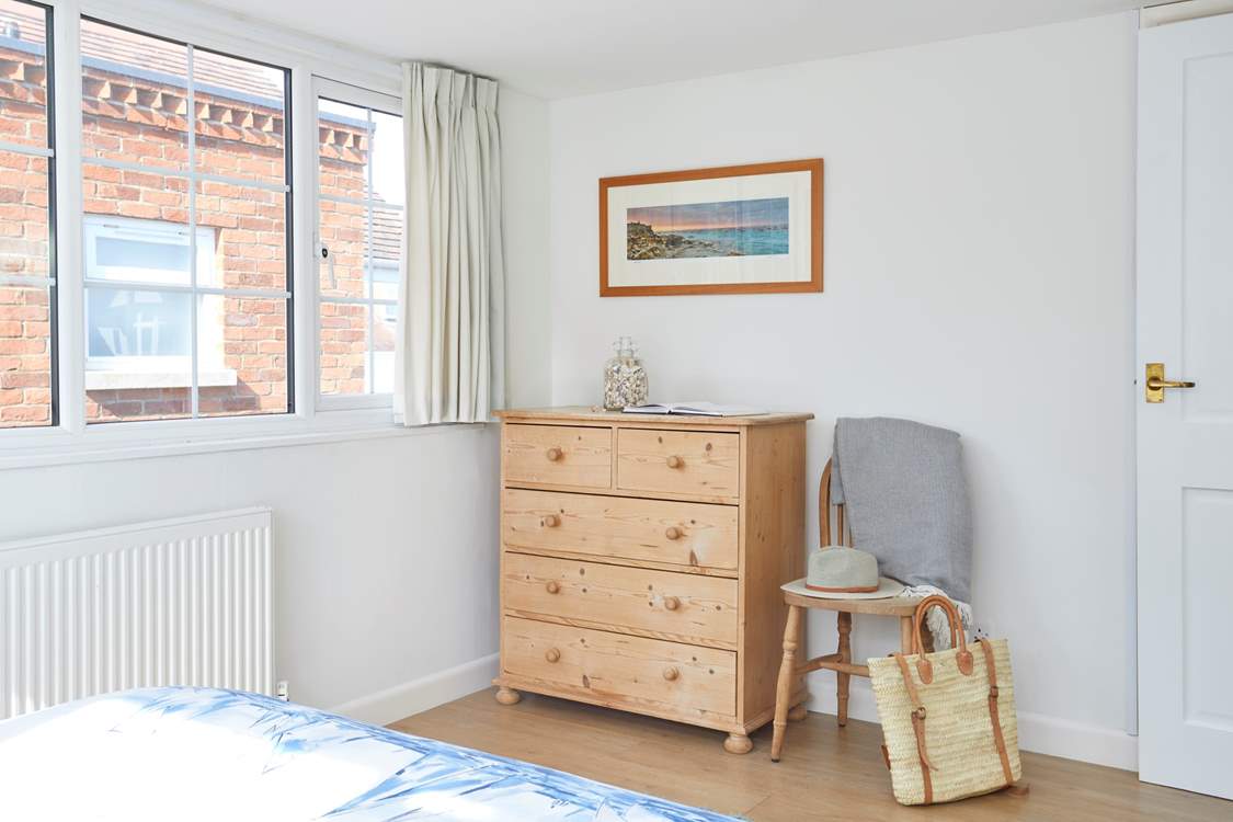 Natural light and a touch of coastal inspiration in this bedroom.